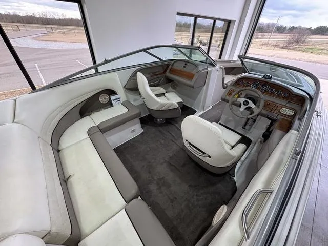 Slide: The Image of Interior of a 2000 Cobalt 226 boat with beige and gray seating. - 3