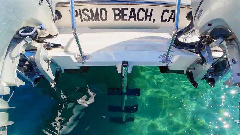 Slide: The Image of 2009 C-Dory TOMCAT 255 boat at Pismo Beach, CA, with clear turquoise water. - 70