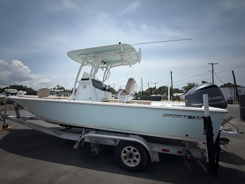 Slide: The Image of 2020 Sportsman Masters 247 Bay Boat on trailer, side view, with Yamaha outboard motor. - 10