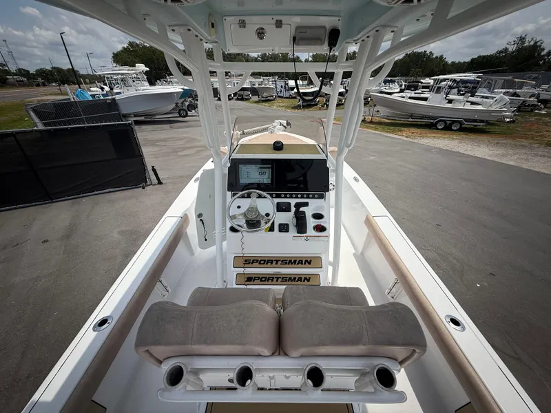 Slide: The Image of 2020 Sportsman Masters 247 Bay Boat interior with dual seats and control panel. - 18