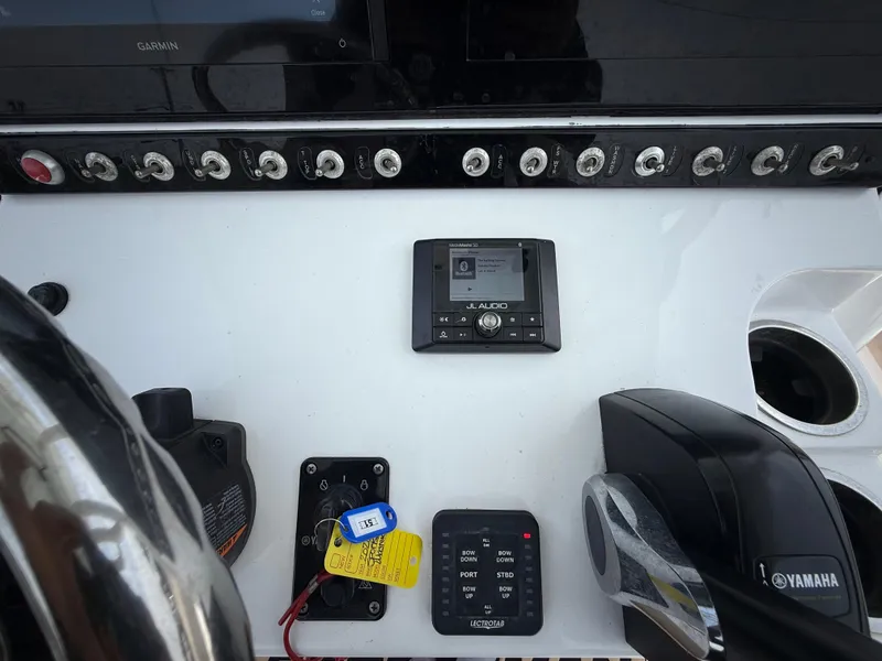 Slide: The Image of Control panel of a 2020 Sportsman Masters 247 Bay Boat with Yamaha throttle. - 22