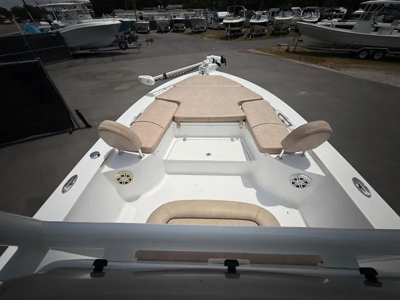 Slide: The Image of 2020 Sportsman Masters 247 Bay Boat with beige seating, docked in a marina. - 29