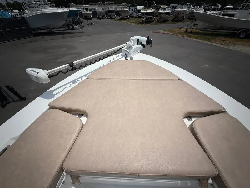 Slide: The Image of 2020 Sportsman Masters 247 Bay Boat with cushioned bow seating and trolling motor. - 34