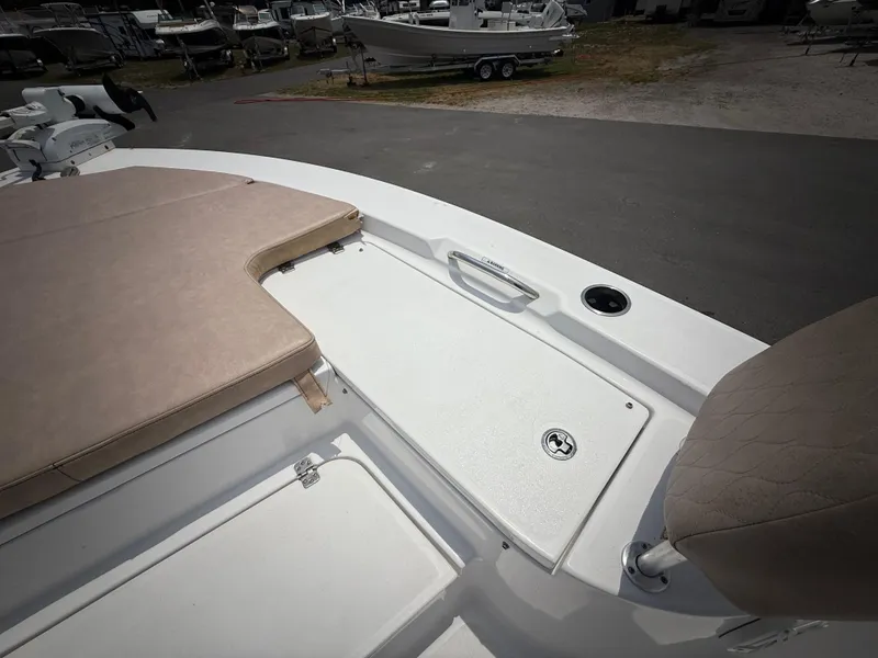 Slide: The Image of 2020 Sportsman Masters 247 Bay Boat deck with seating and storage compartment. - 42