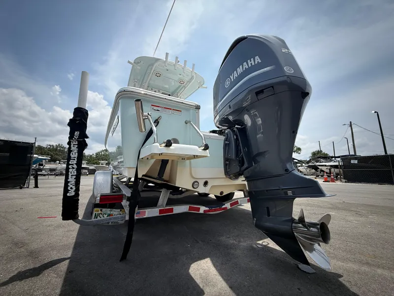 Slide: The Image of 2020 Sportsman Masters 247 Bay Boat with Yamaha engine on trailer. - 9