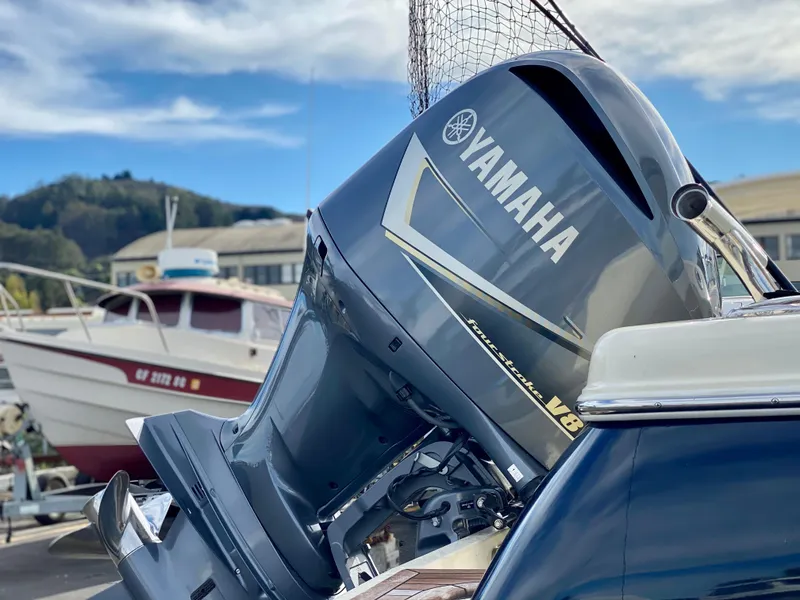 Slide: The Image of 2020 Chris-Craft Calypso 26 with Yamaha V8 outboard engine at marina. - 33
