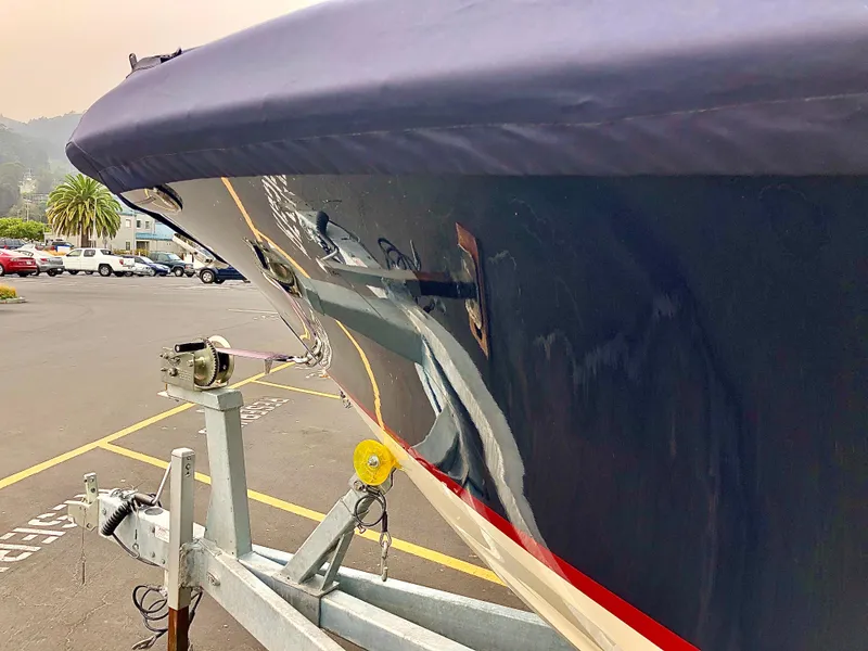Slide: The Image of 2020 Chris-Craft Calypso 26 boat on trailer in parking lot. - 39