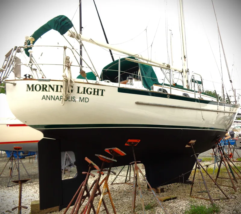Slide: The Image of 1987 Pacific Seacraft 34 sailboat "Morning Light" on stands in Annapolis, MD. - 5