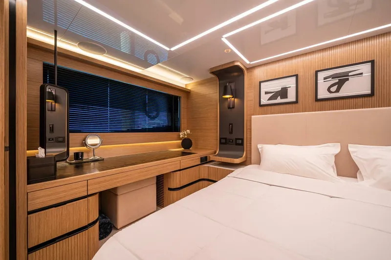Slide: The Image of Luxurious Pearl 62 yacht bedroom interior, 2023 model, featuring modern design and elegant furnishings. - 19