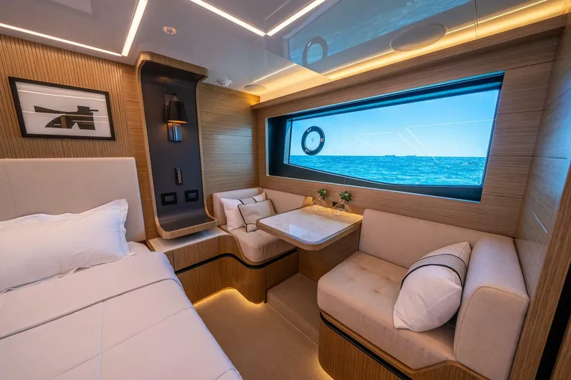 Slide: The Image of Luxurious interior of 2023 Pearl 62 yacht with ocean view window. - 21