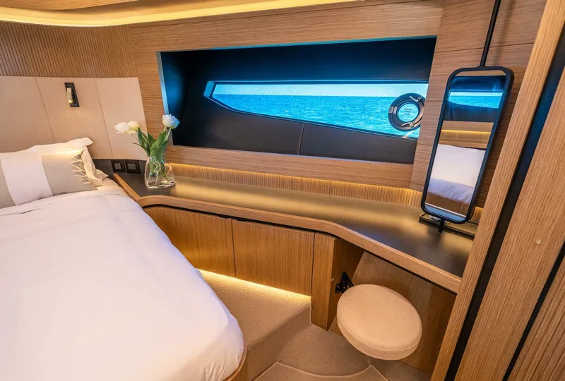 Slide: The Image of Luxurious cabin interior of 2023 Pearl 62 yacht with ocean view window. - 32