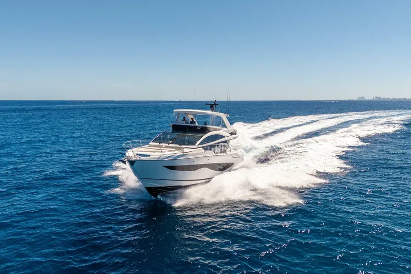 Slide: The Image of Luxury Pearl 62 yacht cruising on open sea, 2023 model. - 4