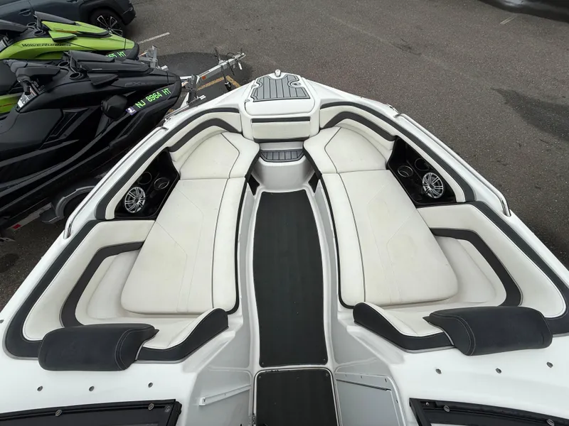 Slide: The Image of 2016 Yamaha Boats 242 Limited S E-Series interior with spacious seating and sleek design. - 11