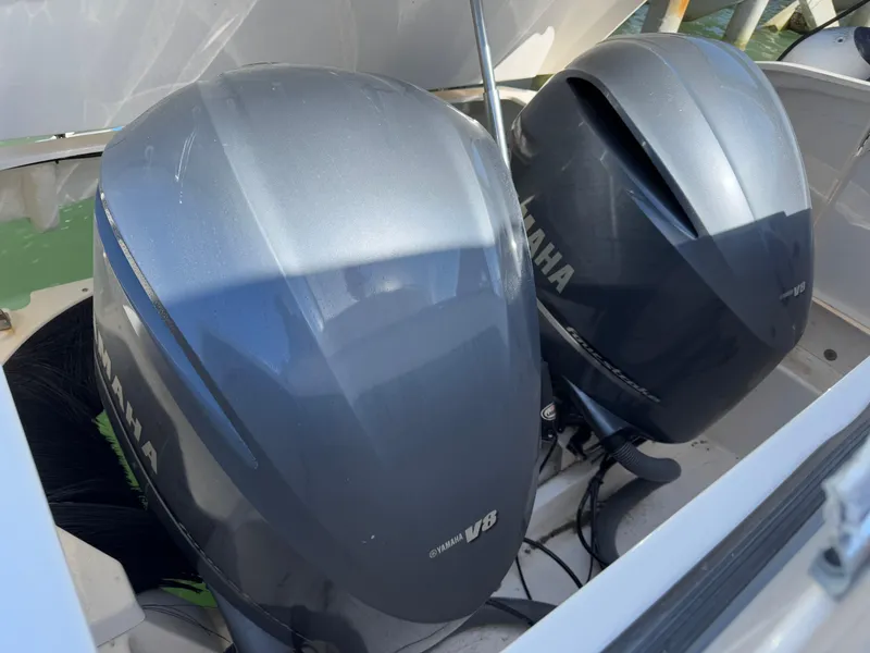 Slide: The Image of Twin Yamaha V8 outboard engines on a 2015 Pursuit SC 365i Sport Coupe. - 34