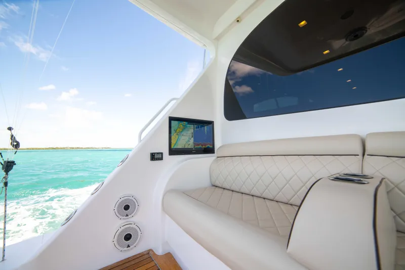 Slide: The Image of Luxurious interior of 2019 Viking 72 Enclosed Bridge yacht with ocean view. - 22