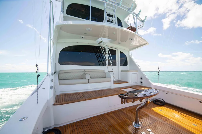 Slide: The Image of 2019 Viking 72 Enclosed Bridge yacht with spacious deck and ocean view. - 25