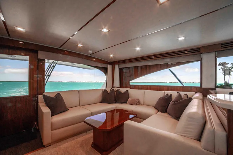 Slide: The Image of Luxurious interior of 2019 Viking 72 Enclosed Bridge yacht with ocean view. - 47