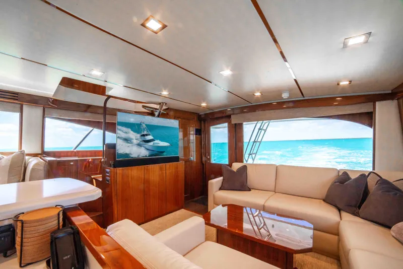 Slide: The Image of Luxurious interior of 2019 Viking 72 Enclosed Bridge yacht with ocean view. - 49
