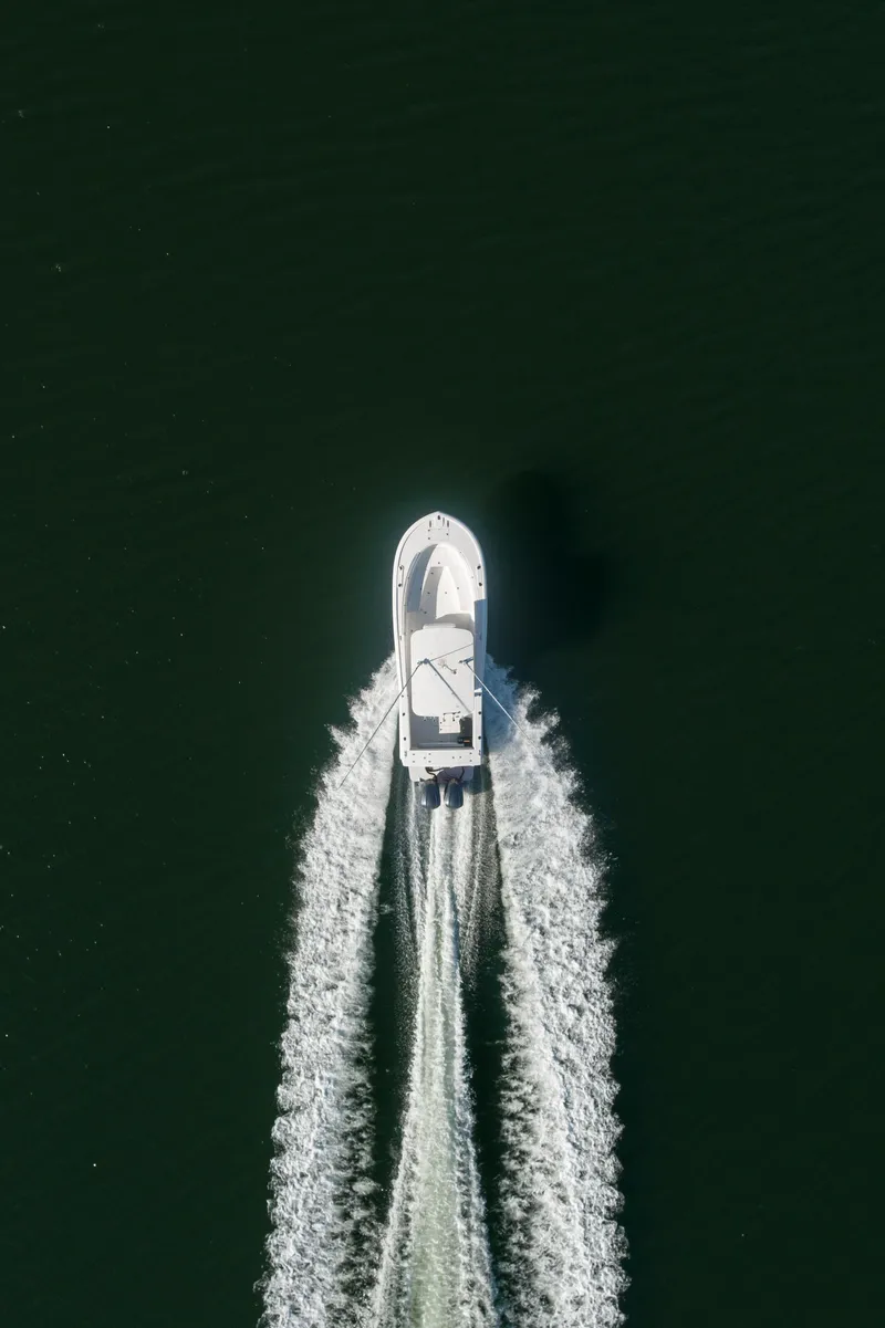 Slide: The Image of Aerial view of a 2005 Buddy Davis 28 boat on water. - 2