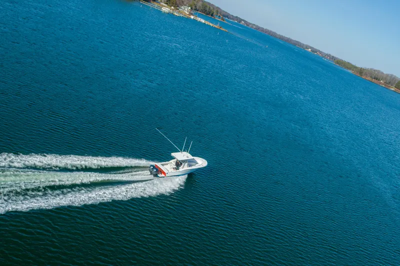 Slide: The Image of Aerial view of a Buddy Davis 28 boat on open water. - 22