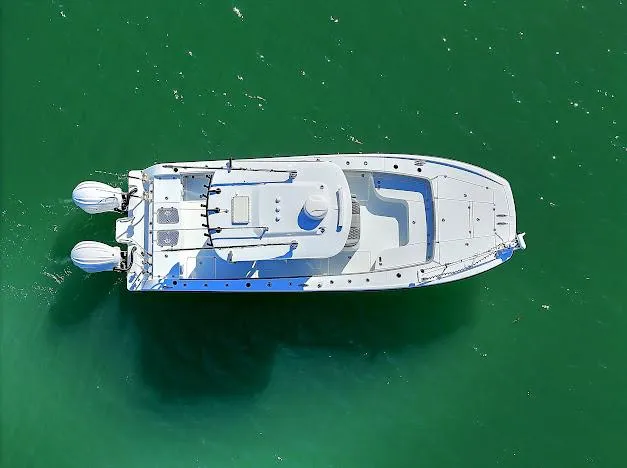 Slide: The Image of Aerial view of 2024 Freeman 28 boat on green water. - 11