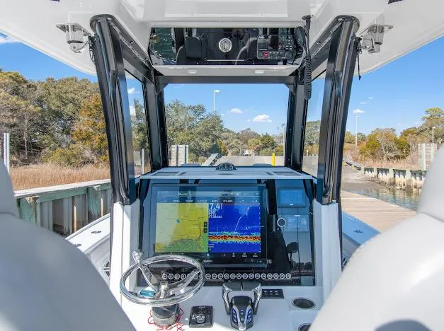 Slide: The Image of Interior view of 2024 Freeman 28 boat with advanced navigation system. - 15