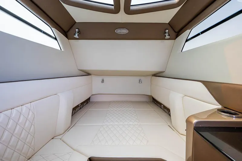 Slide: The Image of Luxurious interior of 2019 Nor-Tech 450 Sport Center Console with elegant seating and modern design. - 23