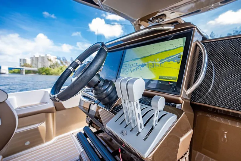 Slide: The Image of 2019 Nor-Tech 450 Sport Center Console helm with advanced navigation system and controls. - 29