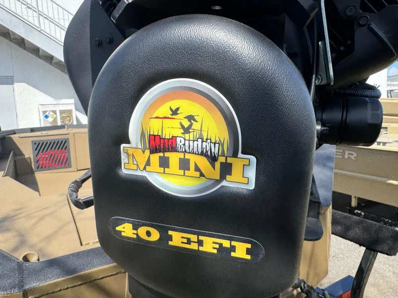Slide: The Image of Excel Eclipse 2025 boat motor with "Mud Buddy Mini 40 EFI" branding. - 4