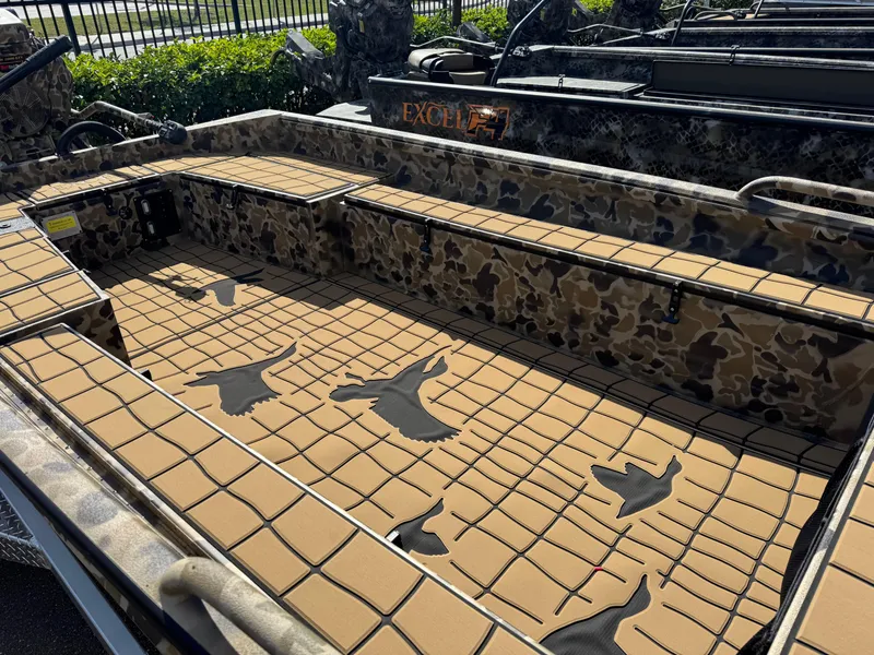 Slide: The Image of 2025 Excel 1860 F4 Shallow Water boat with camouflage interior and bird patterns. - 5