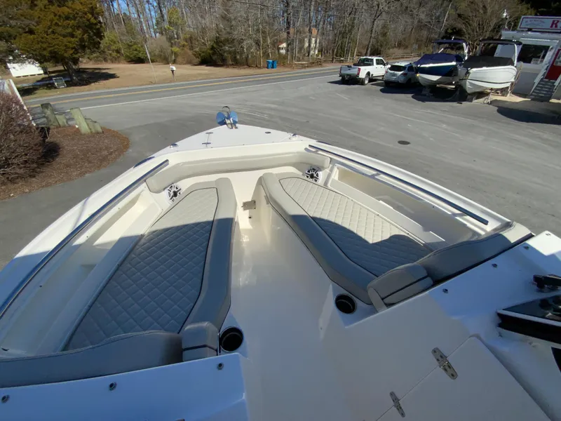 Slide: The Image of 2024 Pursuit DC 246 Dual Console boat with spacious seating and modern design. - 41