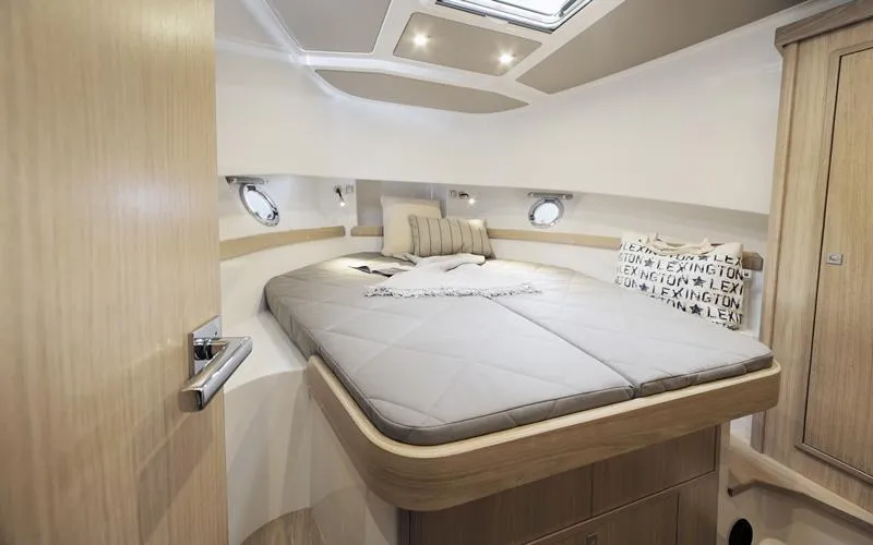 Slide: The Image of Interior of 2015 Sargo 36 Flybridge yacht with cozy bed and modern design. - 28