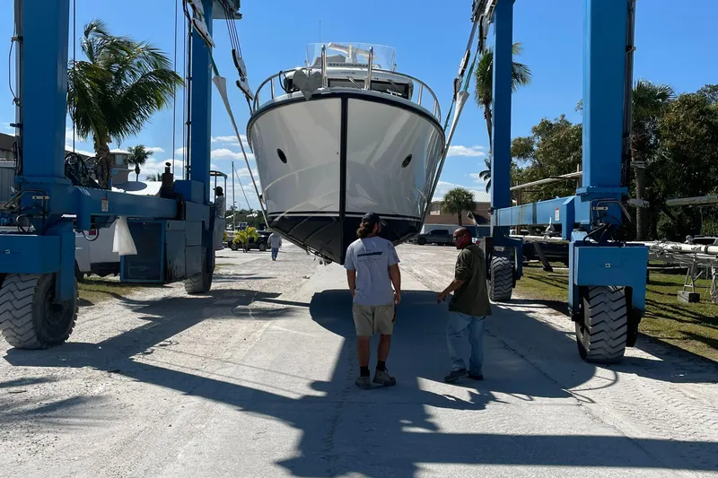 Slide: The Image of 2015 Sargo 36 Flybridge boat being transported by a large lift. - 6