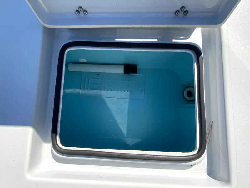 Slide: The Image of Open storage compartment in 2023 Pathfinder 2200 TRS boat. - 16