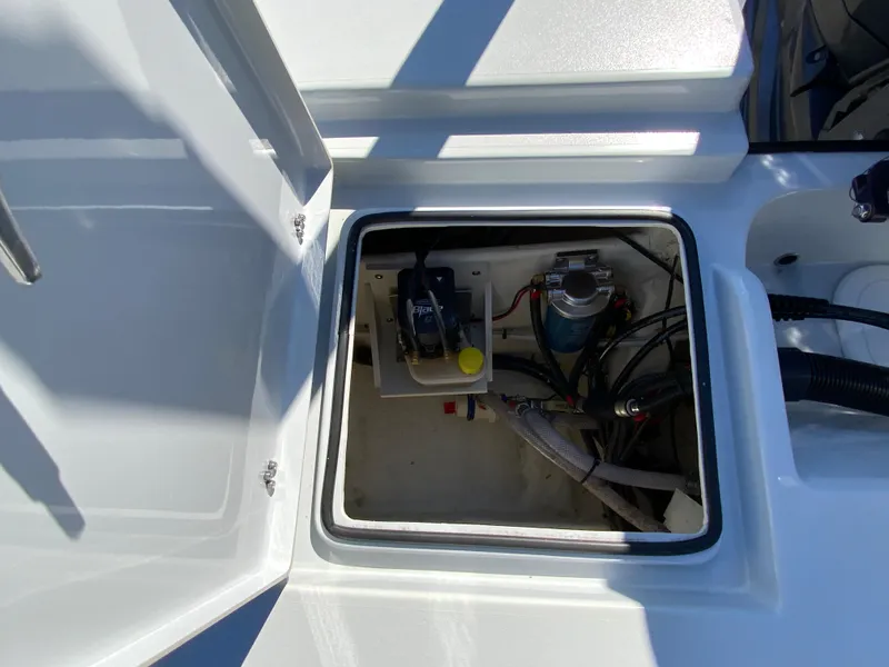 Slide: The Image of 2023 Pathfinder 2200 TRS boat compartment with wiring and components. - 17