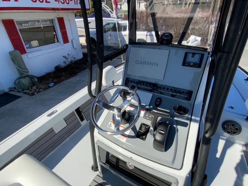 Slide: The Image of 2023 Pathfinder 2200 TRS boat console with Garmin navigation system. - 21