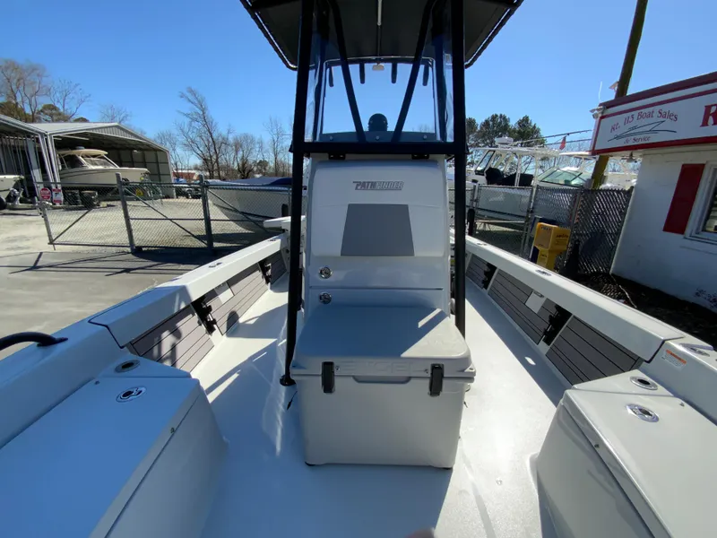Slide: The Image of 2023 Pathfinder 2200 TRS boat interior with seating and storage compartments. - 40