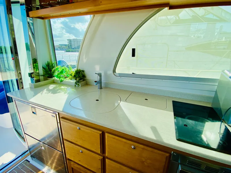 Slide: The Image of Luxurious kitchen area on a 2014 Back Cove 41 yacht with modern amenities. - 17