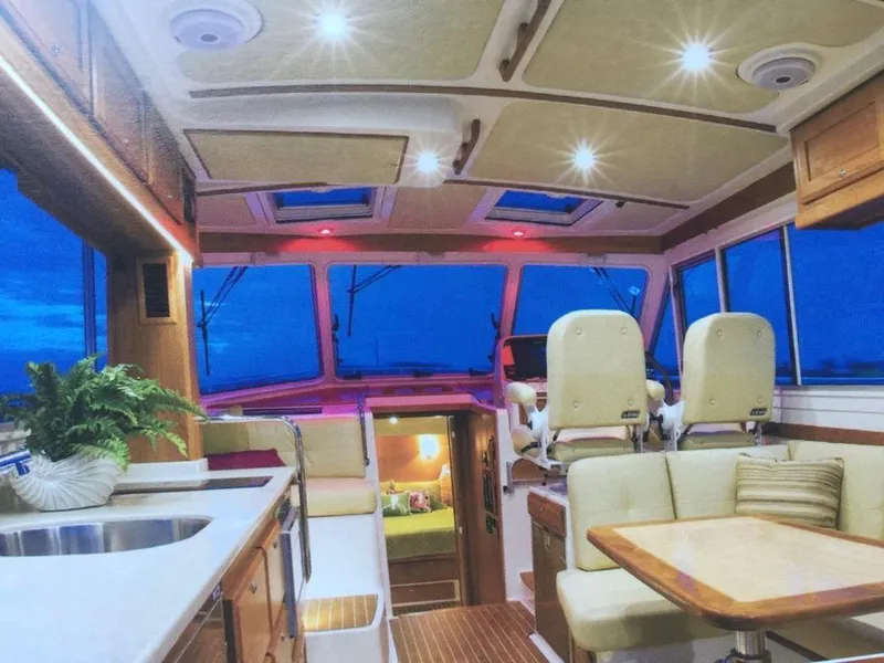 Slide: The Image of Luxurious interior of 2014 Back Cove 41 yacht with modern seating and elegant design. - 20