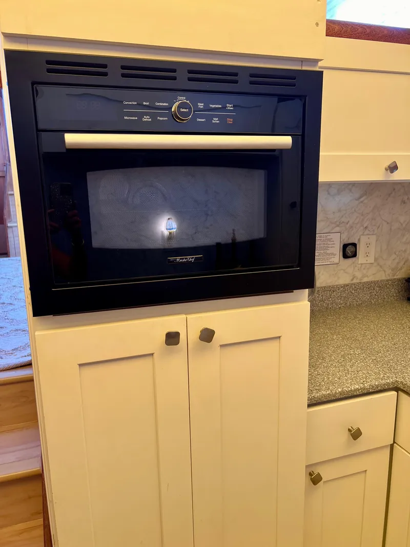 Slide: The Image of Built-in microwave in a kitchen cabinet, Californian 48MY, 1989 model. - 44