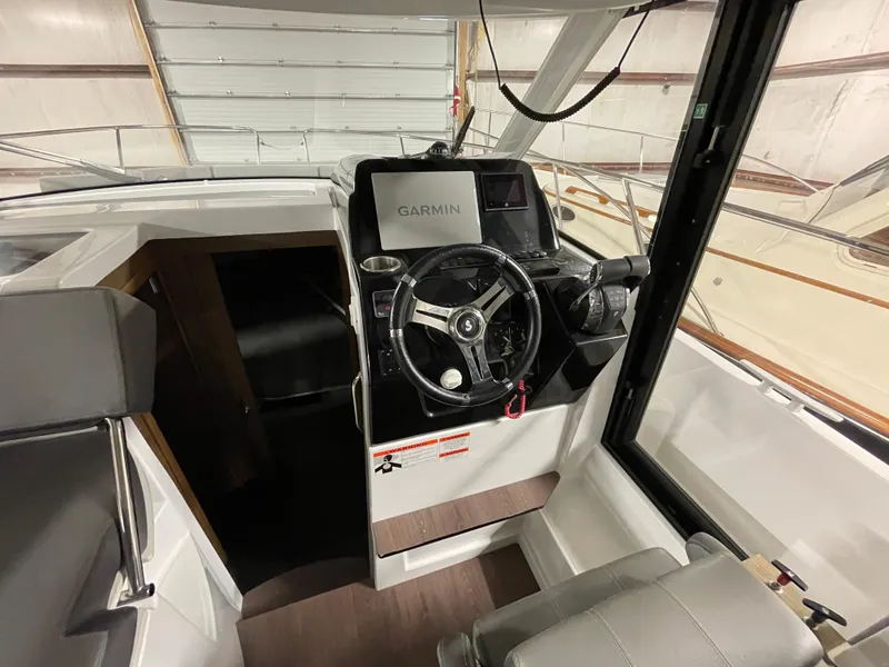 Slide: The Image of Interior helm of 2022 Beneteau Antares 9 with Garmin navigation system. - 23