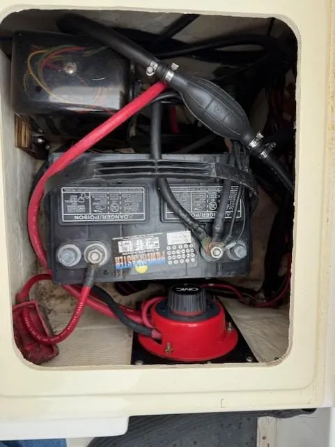 Slide: The Image of Battery compartment of a 1994 Hydra-Sports 2000 CC boat with wiring and connections. - 11
