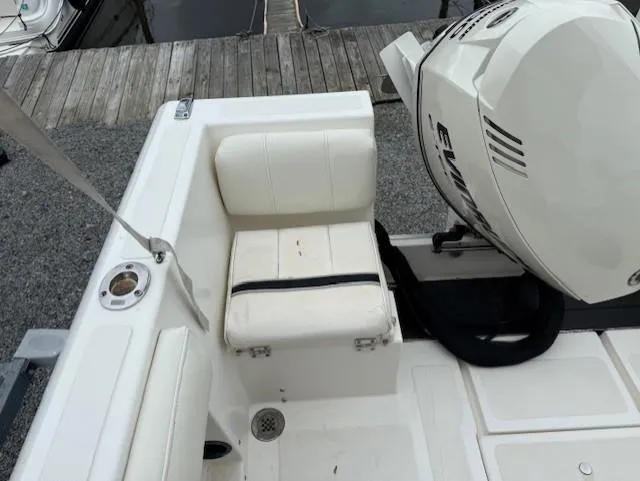 Slide: The Image of 1994 Hydra-Sports 2000 CC boat with Evinrude motor and white seating. - 9