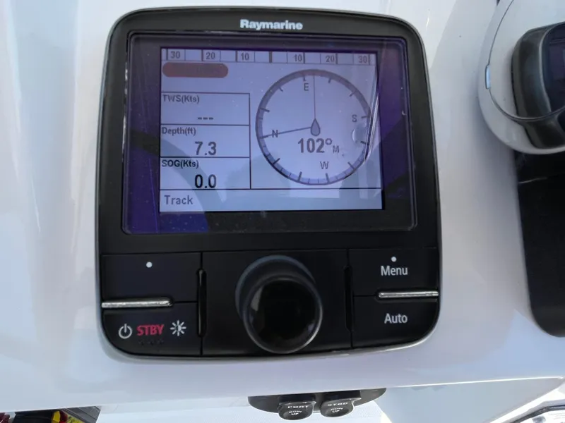 Slide: The Image of Raymarine navigation display on 2014 Southport 27 Center Console showing depth and compass. - 10