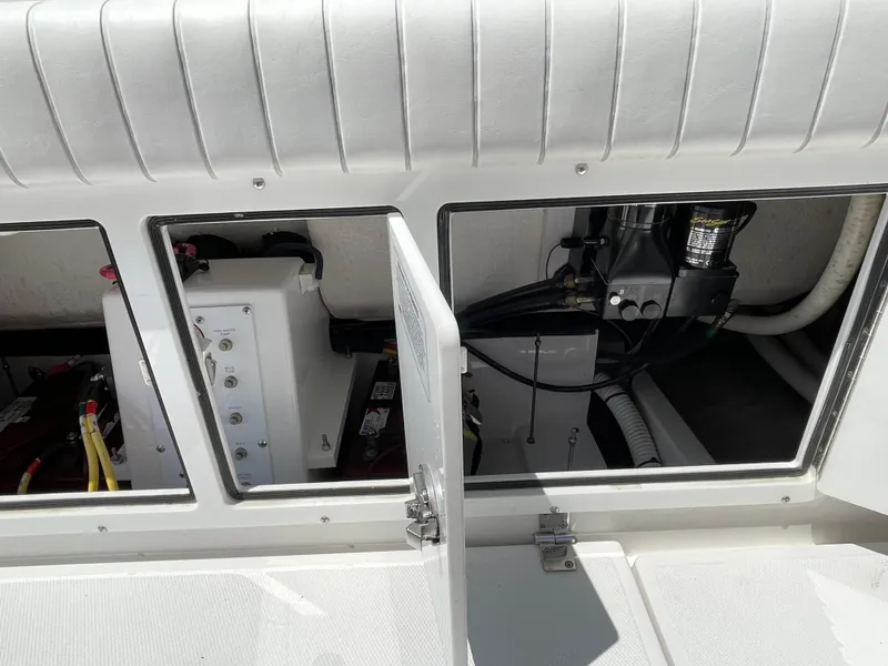 Slide: The Image of 2014 Southport 27 Center Console boat storage compartments and equipment. - 15