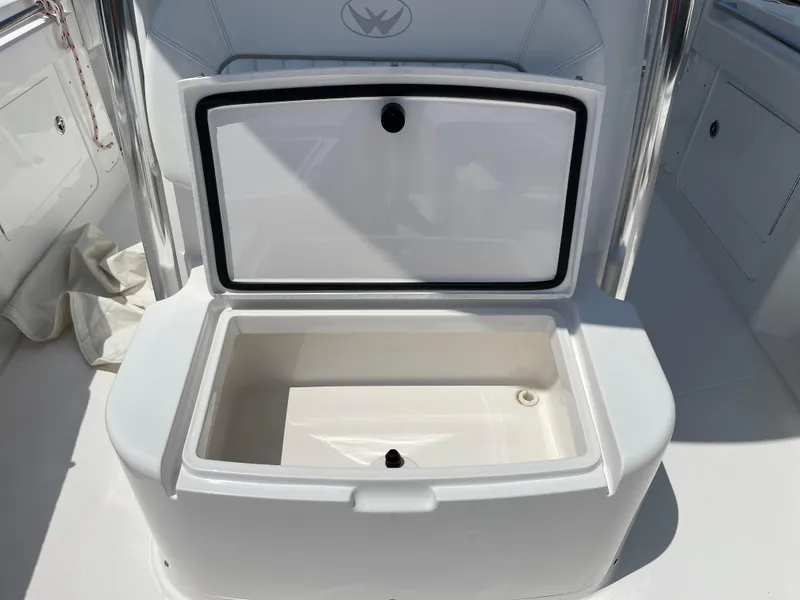Slide: The Image of Open storage compartment on 2014 Southport 27 Center Console boat. - 31