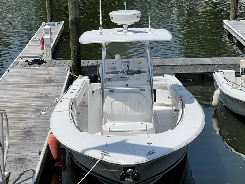 Slide: The Image of 2014 Southport 27 Center Console boat docked at marina. - 4
