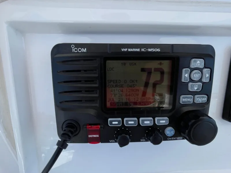 Slide: The Image of Icom VHF Marine IC-M506 radio on 2014 Southport 27 Center Console boat. - 9