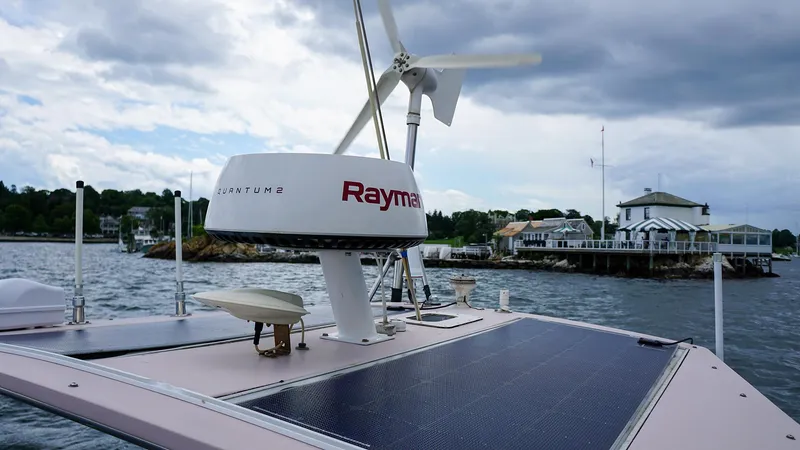 Slide: The Image of 2001 J Boats J/42 sailboat with Raymarine radar and solar panels on deck. - 16