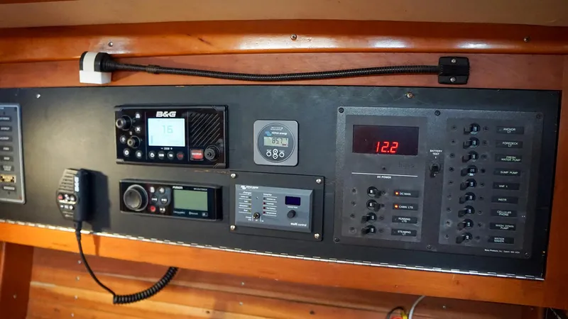 Slide: The Image of Control panel of a 2001 J Boats J/42 sailboat with navigation and communication equipment. - 28